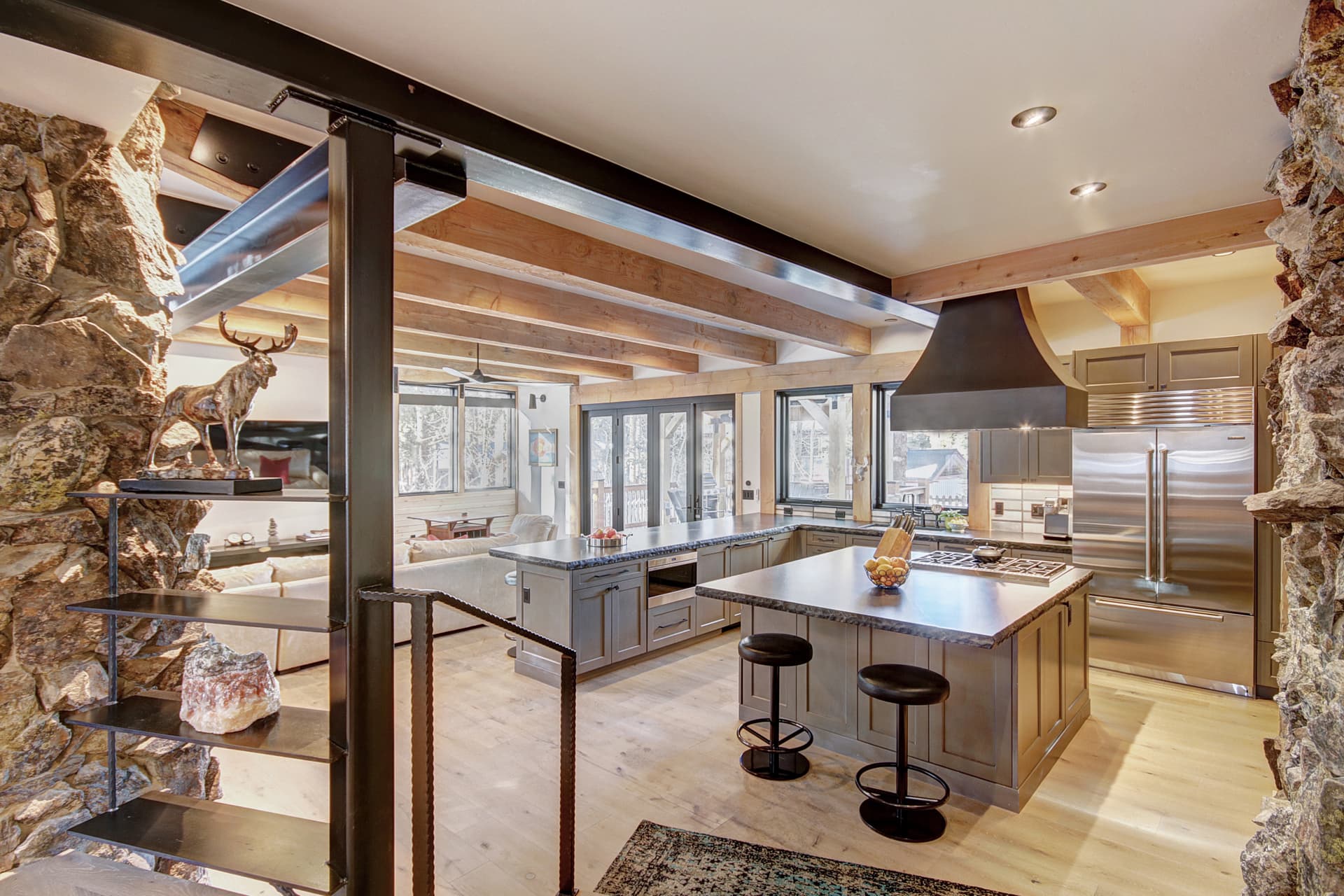 Additional kitchen view with seating of 7 around the islands - Arrow Darrow Breckenridge Vacation Rental