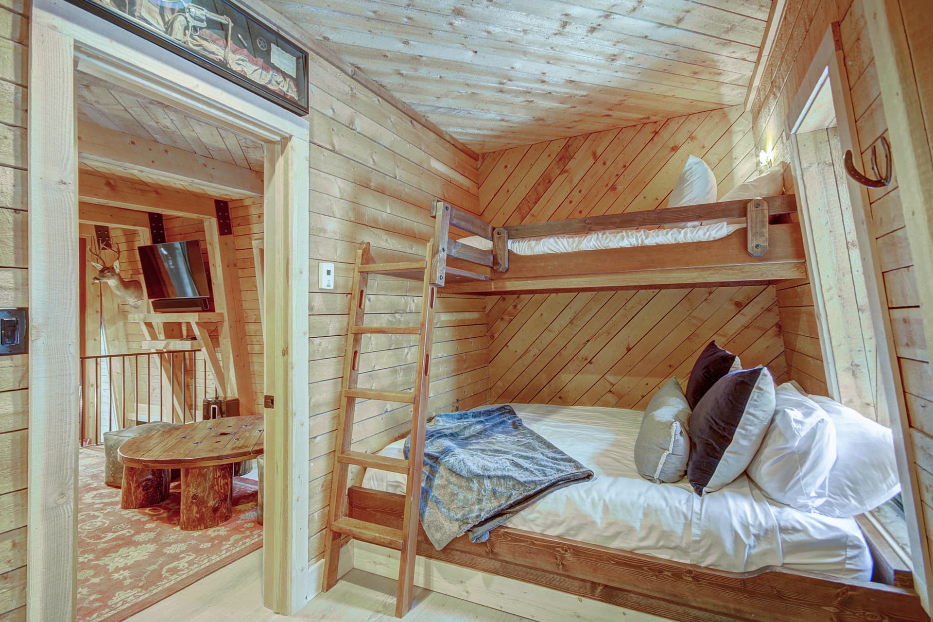 Upper level bunk room with Twin over Queen bunks and Twin size sleeper chair - Arrow Darrow Breckenridge Vacation Rental